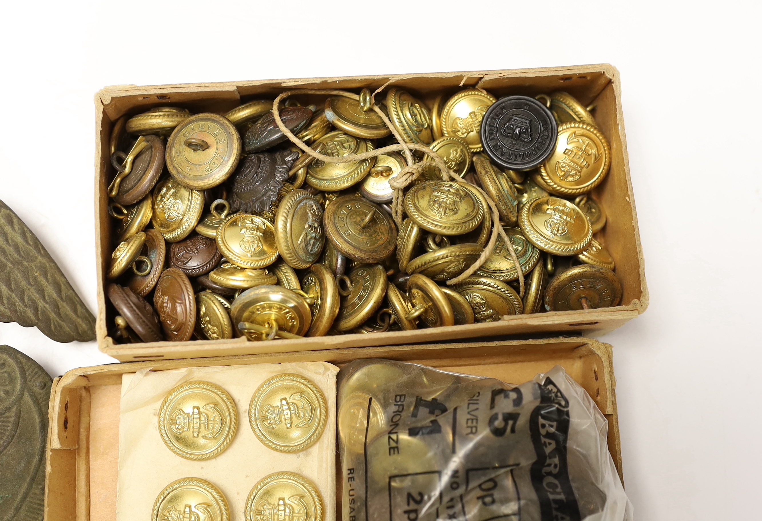 A 19th century Russian style Shako plate and a collection of naval buttons